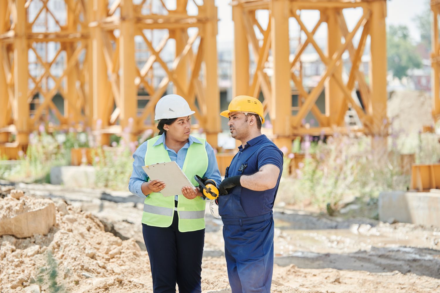 Construction professionals coordinating a facility improvement project